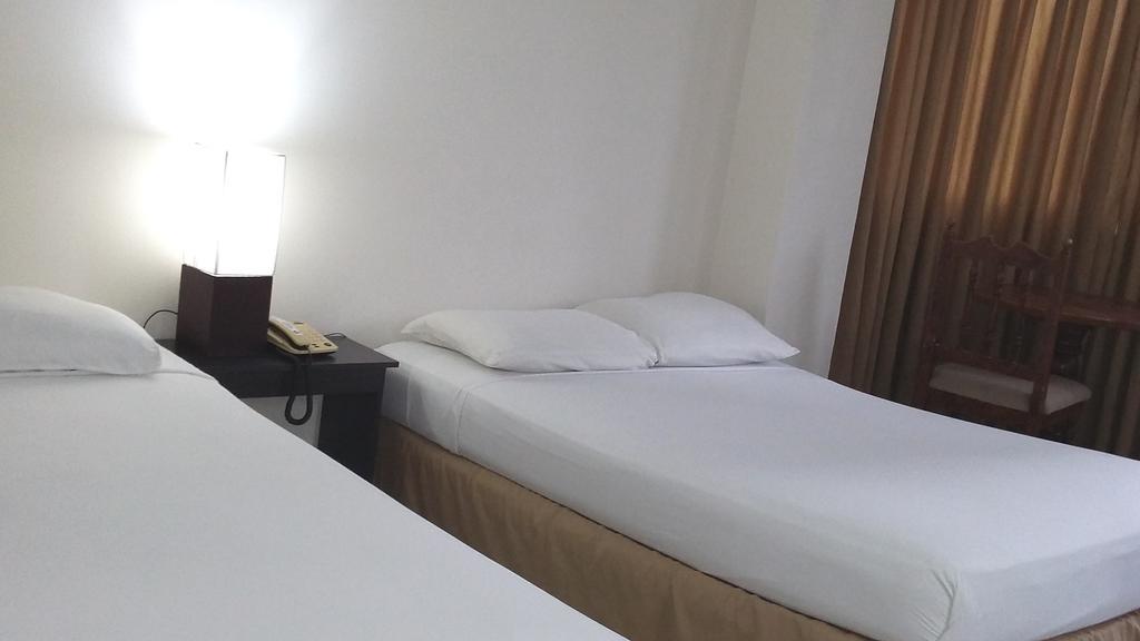 Hotel Aramo Панама Номер фото